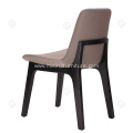 Brown faux leather armless Ventura chairs